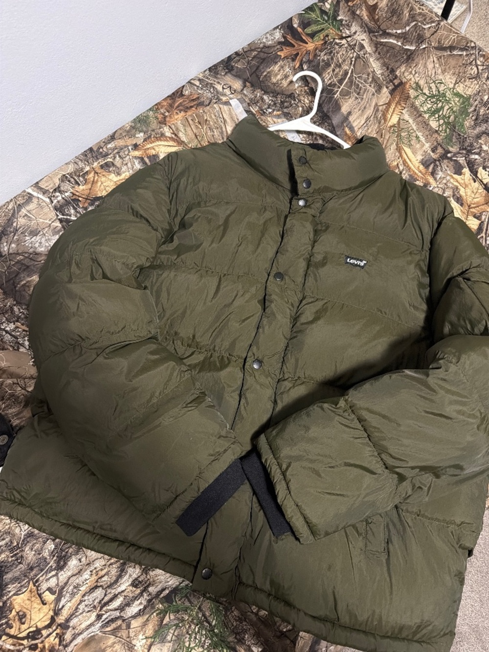 Army green Levi’s puffer coat